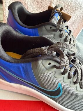 Nike Gray and Blue Athletic Sneakers with Yellow Accent